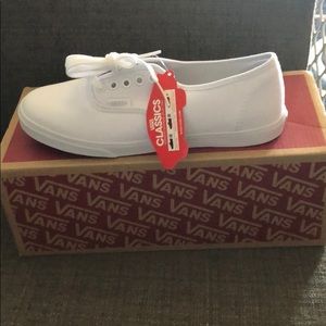 White Vans low tops